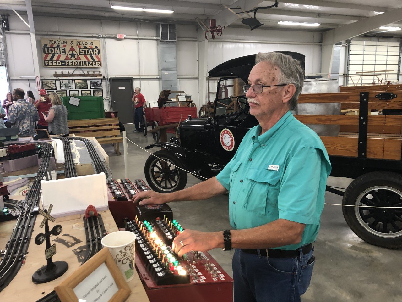 Richard Baker operates the model railroad.at the Johnny Nelson Katy Heritage Museum.